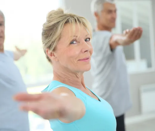 middle to senior age lady in group exercise class