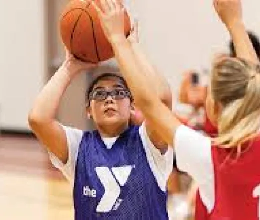 young girls playing basketball